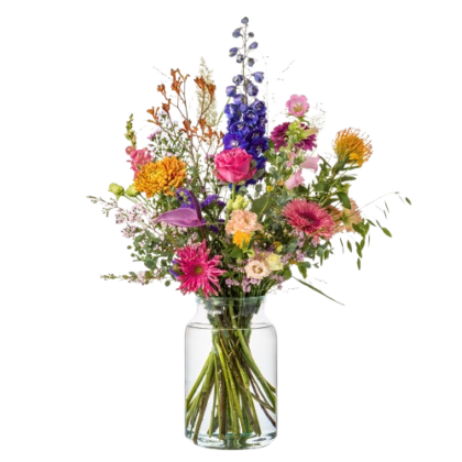 Colorful mixed bouquet in a clear glass jar vase with pink, purple, yellow, and white flowers.