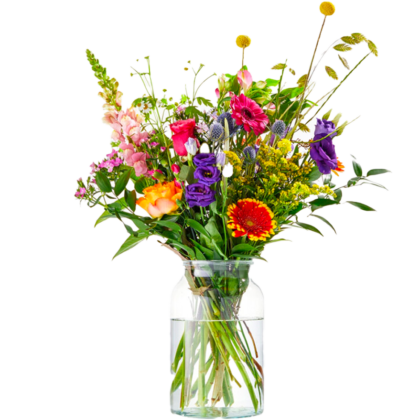 Colorful bouquet of mixed flowers in a clear glass vase with water.